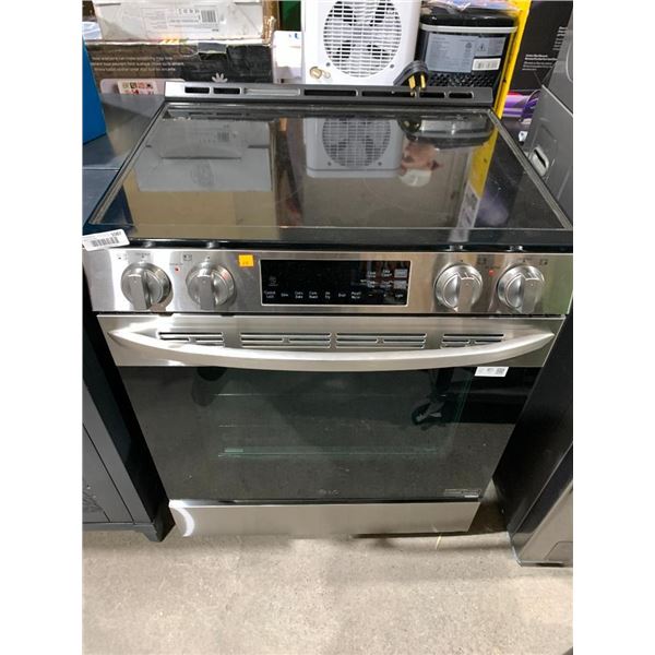 LG glass flat top oven and stove with four burners