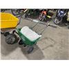 Image 1 : SCOTTS INDUSTRIAL SOLID TIRE WALK BEHIND SALT SPREADER WITH BAG OF SALT