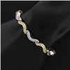 Image 8 : Solid 18K TT Gold 1.40 ctw Fine Round Brilliant Diamond Wavy Link Tennis Bracele