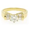 Image 1 : 14k Yellow Gold 0.91 ctw Round Diamond Solitaire Channel Baguette Engagement Rin