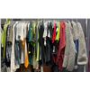 Image 1 : Rack full of assorted movie set dec clothing - includes jackets / hoodies / tank tops / polos etc - 