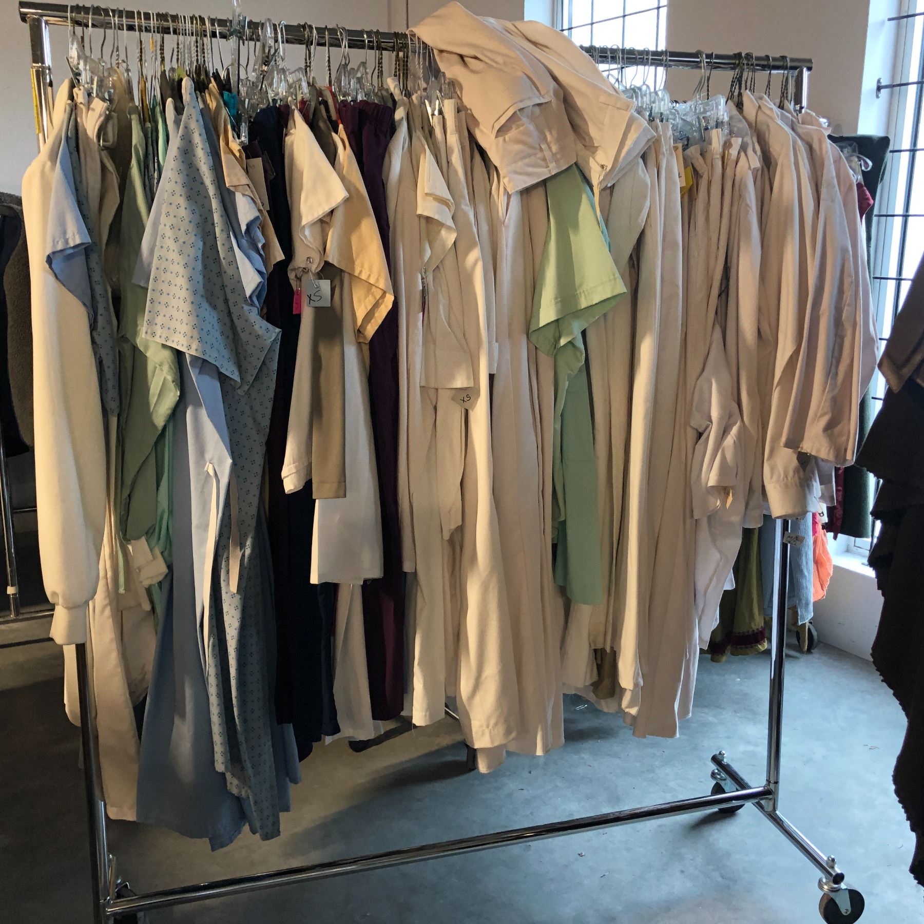 Legends of Tomorrow - Large rack full of assorted actors' set dec ...