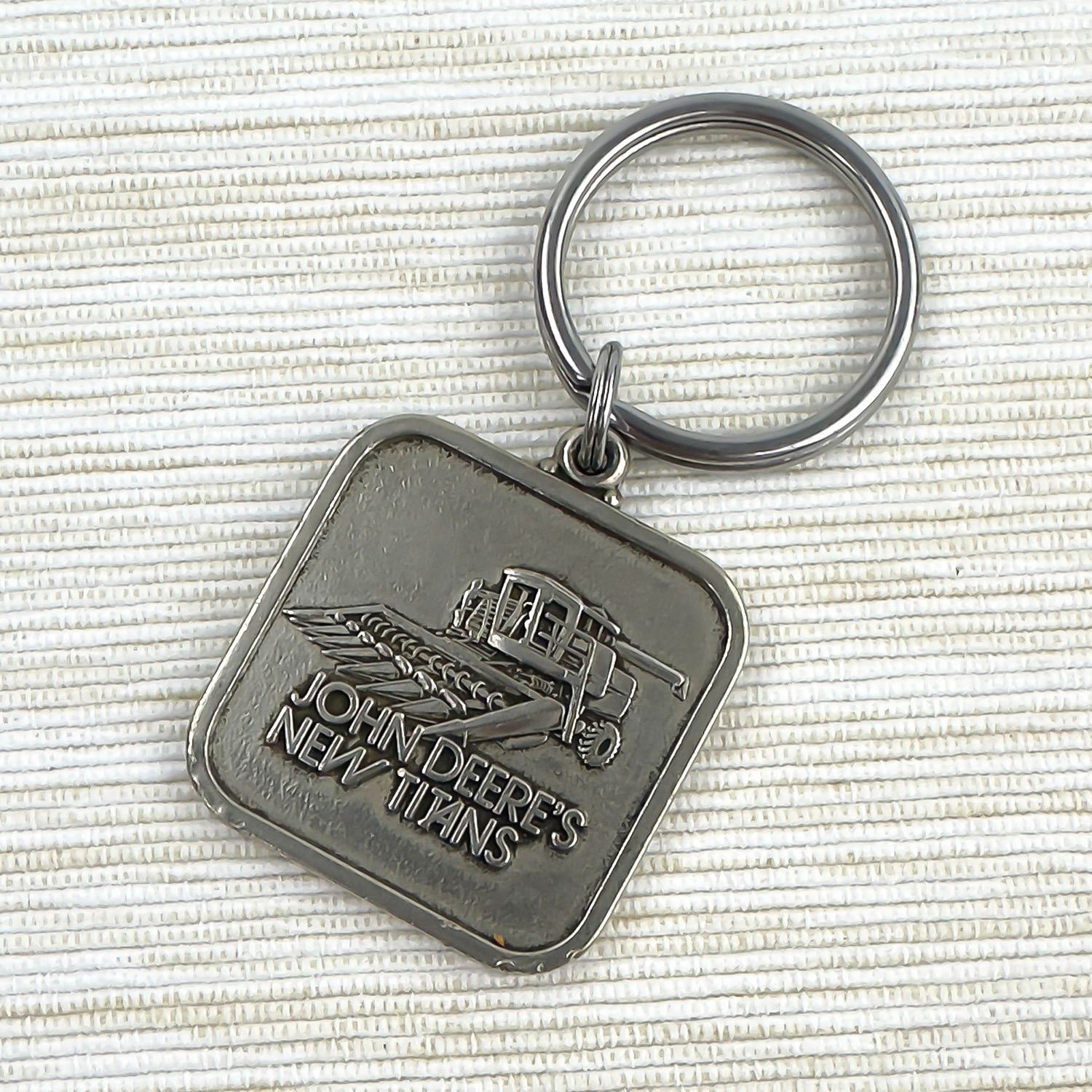 VINTAGE JOHN DEERE’S NEW TITANS COMBINE KEYCHAIN