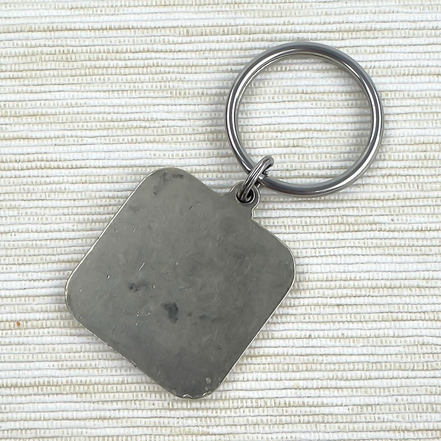 VINTAGE JOHN DEERE’S NEW TITANS COMBINE KEYCHAIN