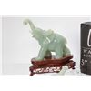 Image 2 : Four jade like elephant figures on camphor wood bases, each approximately 6"