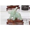Image 5 : Four jade like elephant figures on camphor wood bases, each approximately 6"