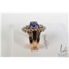 Image 2 : Ladies 14kt yellow gold and oval mixed cut 1.75ct tanzanite gemstone and .16cts of round full cut wh