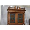 Image 2 : Antique Dutch red oak court cupboard with carved panels, decorative columns and leaded glass doors, 