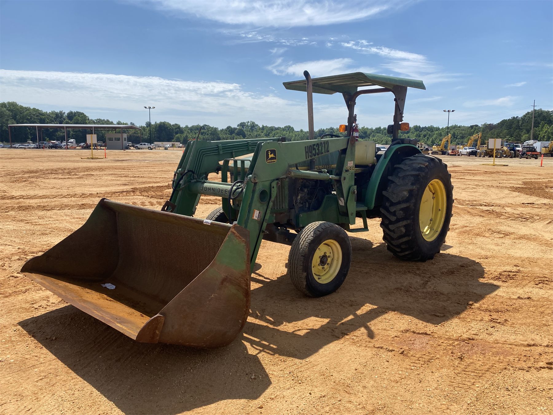 1995 JOHN DEERE 5400 Farm Tractor - J.M. Wood Auction Company, Inc.