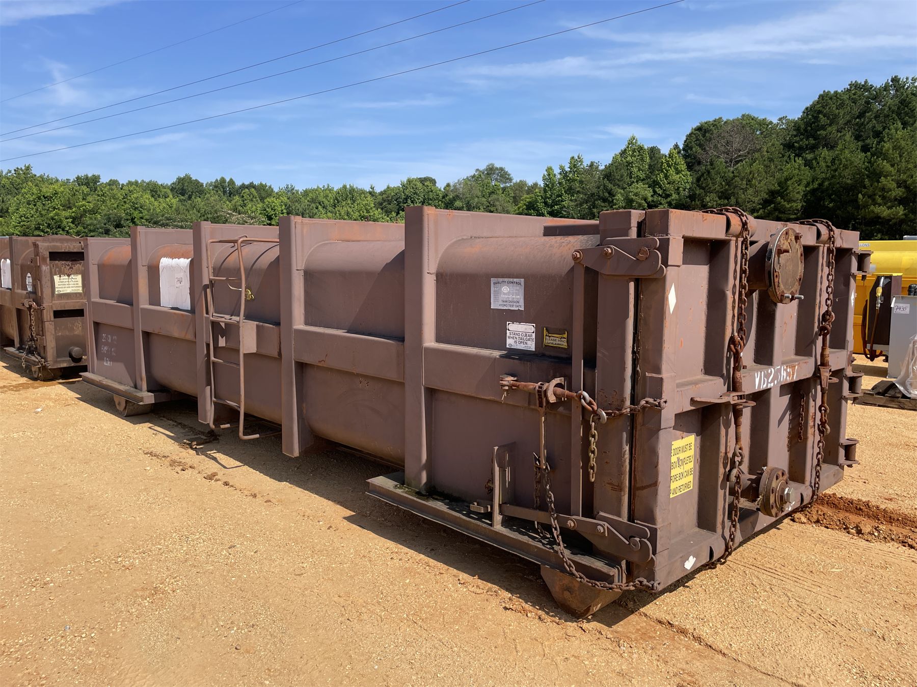 ROLL OFF TRASH COMPACTOR - J.M. Wood Auction Company, Inc.