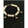 Image 2 : Vintage Small Size Genuine Pearls with Gold Hearts Tassel Braceletwith 14k Gold Clasp