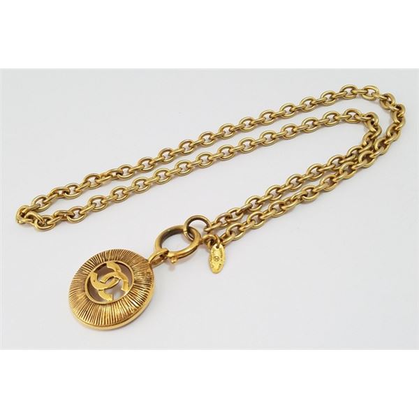Chanel Gold-tone Metal CC Logo Cutout Sunburst Pendant Necklace