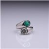 Image 1 : 18k White Gold Moissanite & Emerald Crossover Ring by Carlo Rici