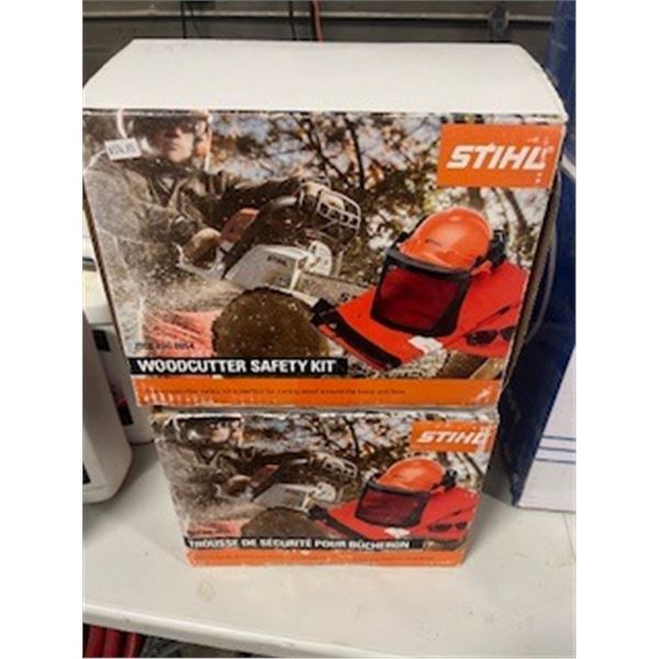 2 chainsaw kits with helmet, pants, and googles