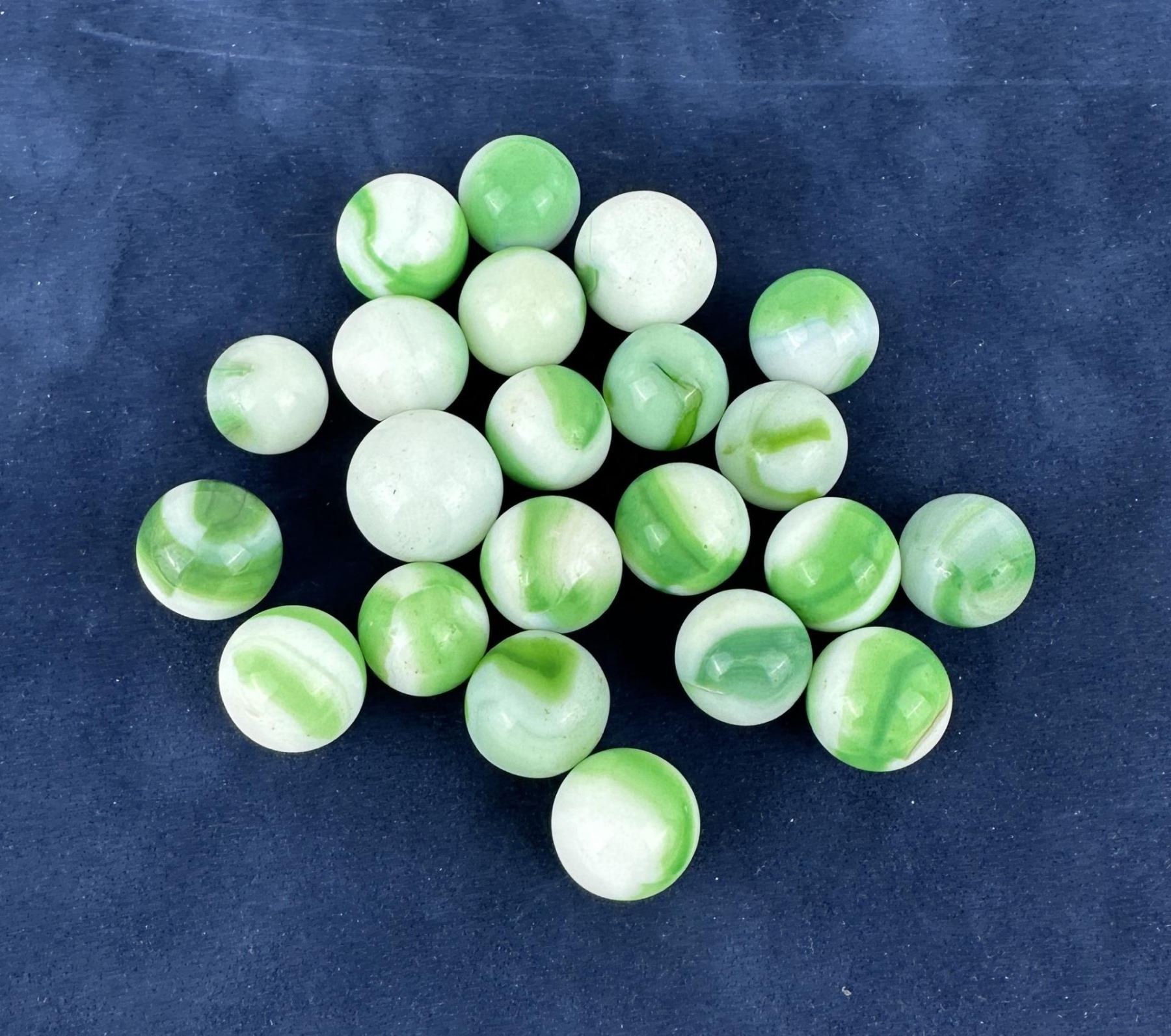 Collection of Antique Green and White Marbles