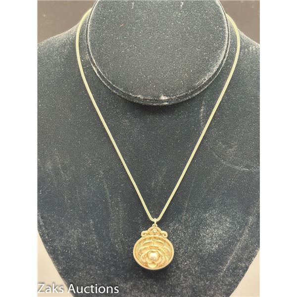 STERLING FLOWER PENDANT