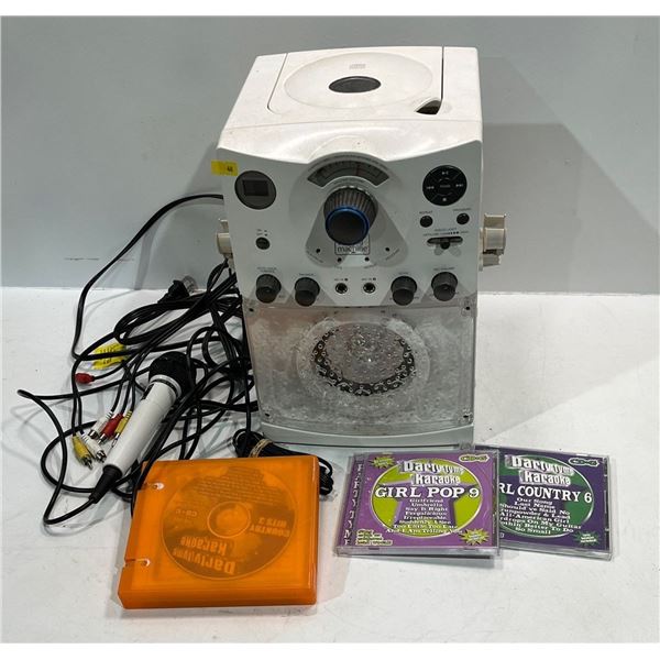 The Singing Machine (Karaoke) includes One Microphone and Multiple CD's (primarily country music)