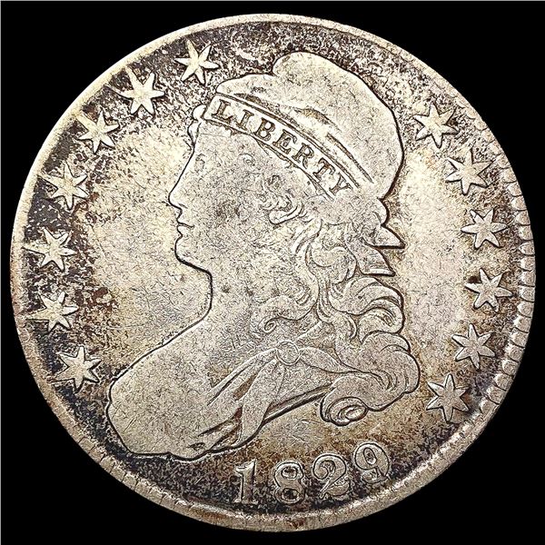 1929/7 Capped Bust Half Dollar NEARLY UNCIRCULATED