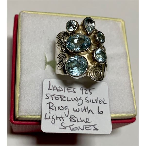 LADIES .925 STERLING SILVER RING W/6 LIGHT BLUE STONES, SZ 7 1/4