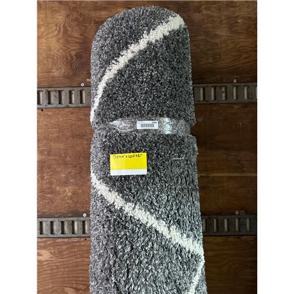 7' 10" x 10' 6" Area Rug