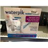 Image 1 : Waterpik water flosser