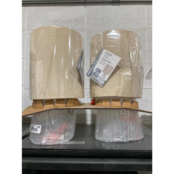 A set of Table lamps   8 x 18.7 modern series. clear glass. linen fabric shade.