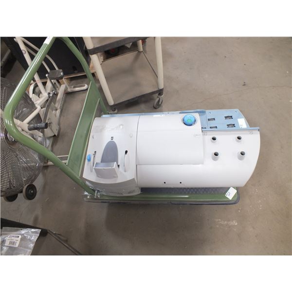 Green Cart On Wheels & Postage Machine