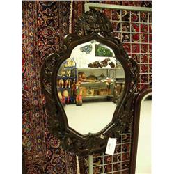 Beveled mirror with dark finish hand carved frame- 40" H, 28" W (1)