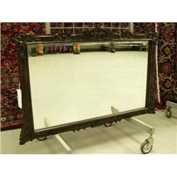Beveled mirror with dark finish hand carved frame- 29-1/4" H, 47" W (1)