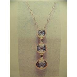 Diamond pendant and chain 10 K yellow gold- diamonds are full cut approx. 0.15 carats- estimated rep