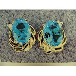 Blue topaz and diamond earrings 14 K yellow gold- blue topaz are oval, faceted approx. 2.50 carats, 