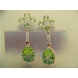 Peridot and diamond earrings 14 K yellow gold- peridot are pear and round, faceted approx. 2.50 cara