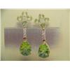 Image 1 : Peridot and diamond earrings 14 K yellow gold- peridot are pear and round, faceted approx. 2.50 cara