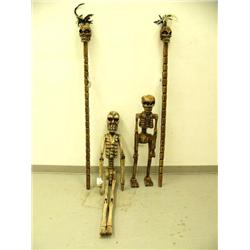 Lot of 4 skeletal figurines and staffs (1)