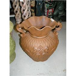 Brown cast iron pot with flowers- 23" H, 15" D, 21" W (100)