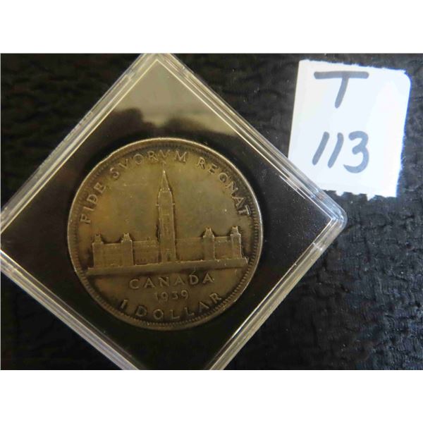 One 1939 Canadian 80% silver dollar, sealed in its own case, even toning both sides, lightly 