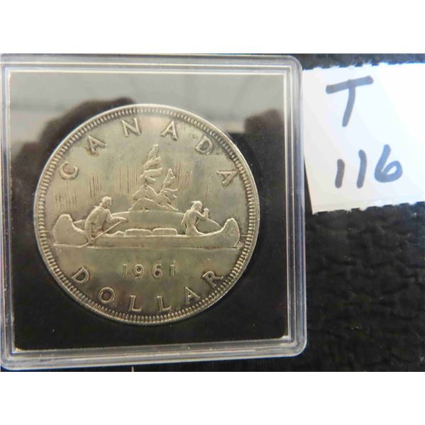 One 1961 Canadian dollar coin 80% silver, die clash on Queen’s throat, almost uncirculated,