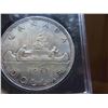 Image 2 : One 1961 Canadian dollar coin 80% silver, die clash on Queen’s throat, almost uncirculated,