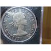 Image 3 : One 1961 Canadian dollar coin 80% silver, die clash on Queen’s throat, almost uncirculated,