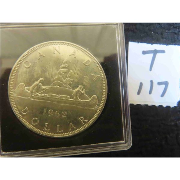 One 1962 Canadian dollar coin 80% silver, almost uncirculated, even light toning on both sides, 