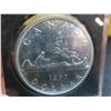 Image 2 : One 1965 Canadian dollar coin 80% silver, uncirculated, TYPE V,  BU-PL-MS ? nice bright coin