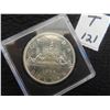 Image 1 : One 1966 Canadian dollar coin 80% silver, uncirculated, Large bead, High Grade, sealed in case,