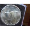 Image 2 : One 1967 Canadian dollar coin 80% silver, uncirculated, toning starting on obverse, reverse