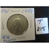 Image 1 : One 1959 Canadian 80% silver 50 cent coin, circulated ungraded. Nice coin