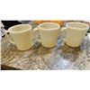 Image 1 : SET OF THREE, SCARCE, IVORY COLOURED, D HANDLE, FIRE KING MUGS