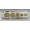 Image 1 : Gold Maple Leaf Uniface Lucite Replica Set from the Royal Canadian Mint