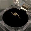 Image 2 : 10KT Gold ring with 15pt Diamond Solitaire - 1.3 grams retail $750