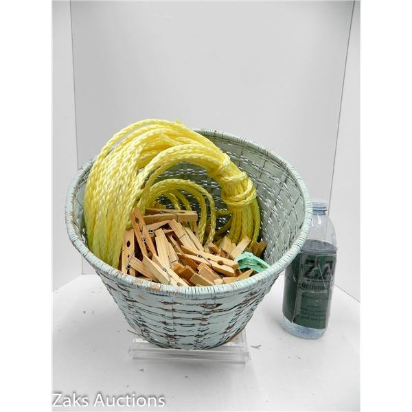 BASKET WITH VINTAGE WOODEN CLOTHES PEGS AND ROPE