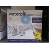 Image 1 : 2 Waterpik Water Flosser Twin Packs