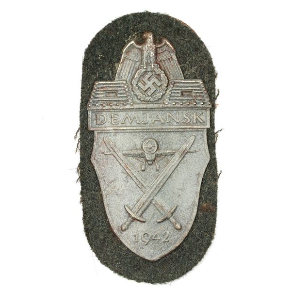 A GERMAN ARMY DEMJANSK SHIELD SLEEVE PATCH